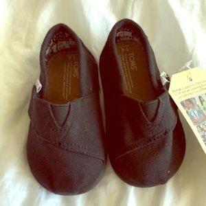 Black baby Toms